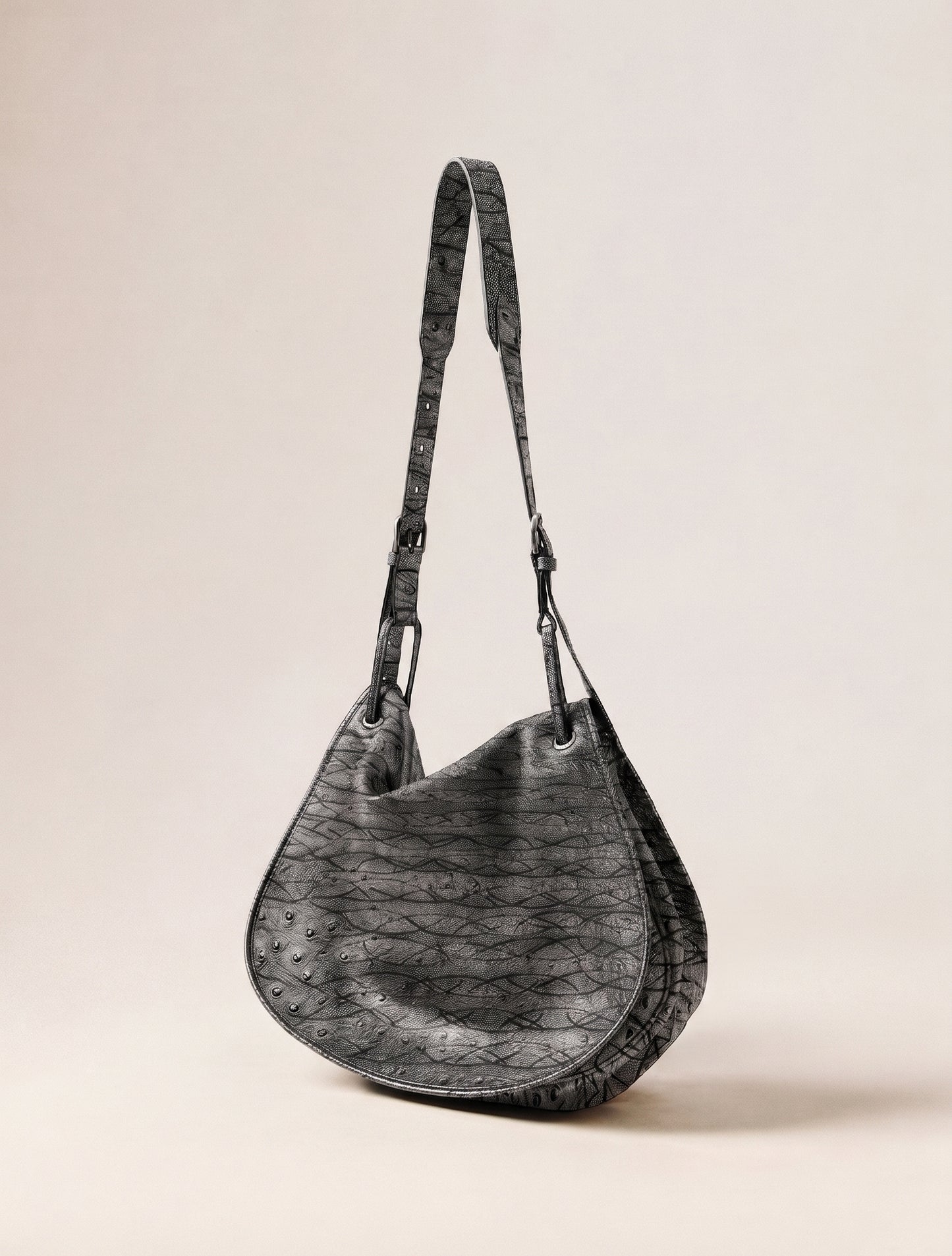 Shadow Cutline™ Textured Leather Hobo Saddle Bag