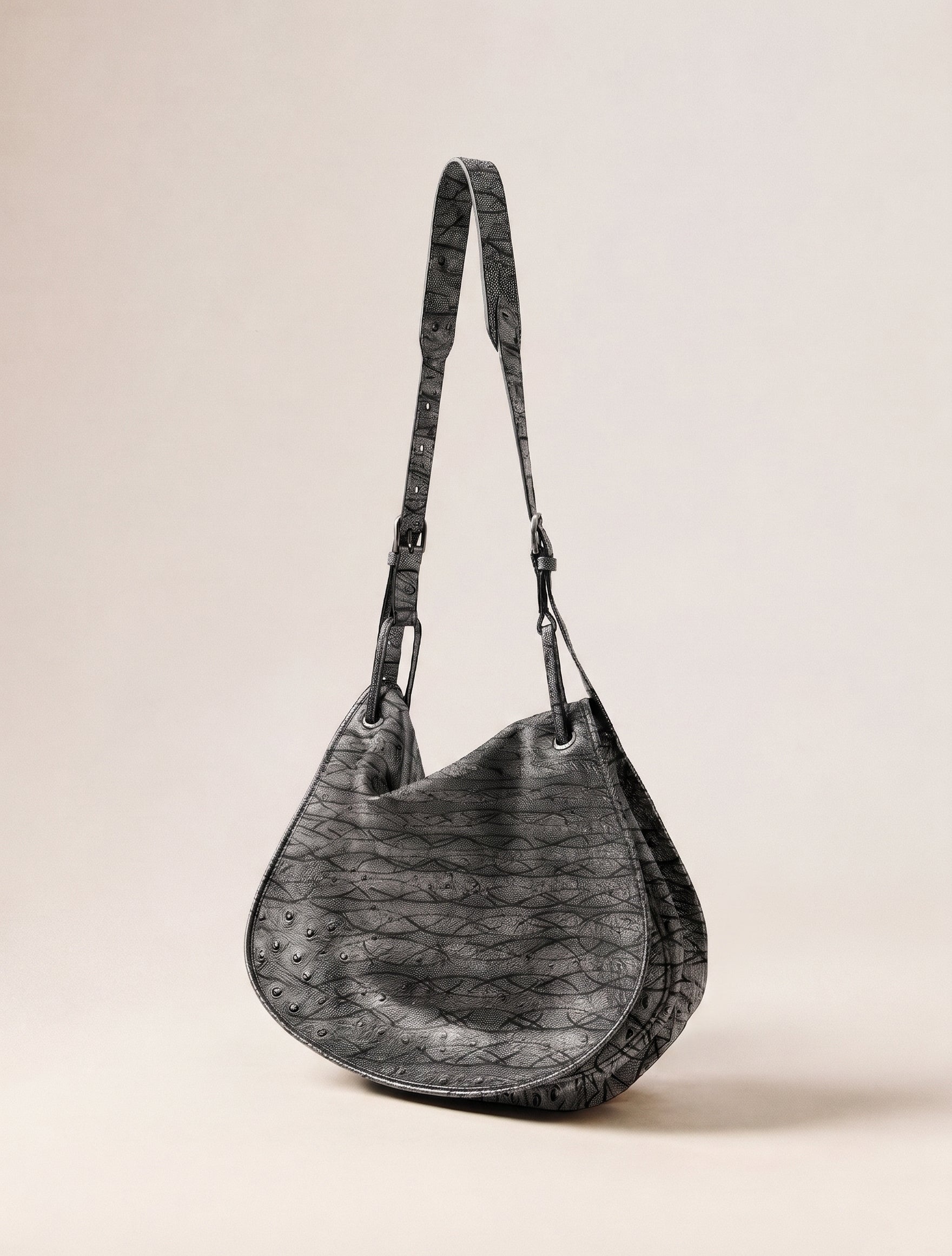 Shadow Cutline™ Textured Leather Hobo Saddle Bag
